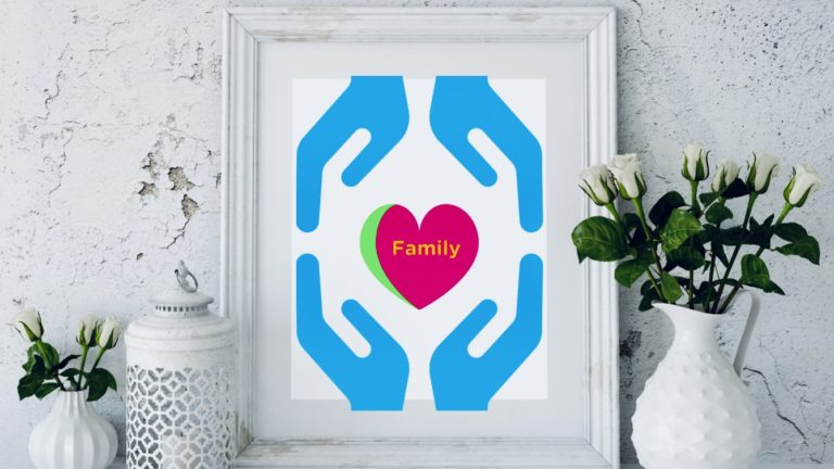 Frameon a shelf with hands holding a heart that has Family written on it.